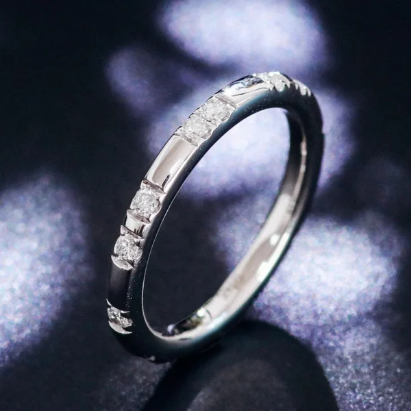 Additional product photograph showing the ring design, setting and band.