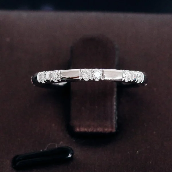 Additional product photograph showing the ring design, setting and band.