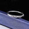 Product photograph showing the mixed-cut band ring.