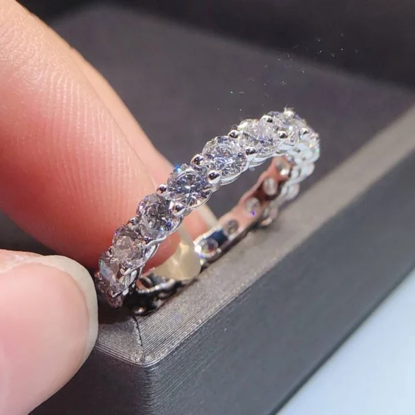 Additional product photograph showing the ring design, setting and band.