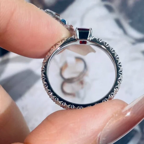 Additional product photograph showing the ring design, setting and band.