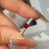 Additional product photograph showing the ring design, setting and band.