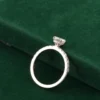 Additional product photograph showing the ring design, setting and band.