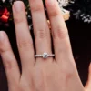 Additional product photograph showing the ring design, setting and band.