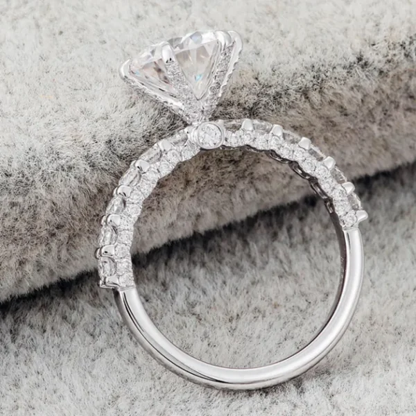 Additional product photograph showing the ring design, setting and band.