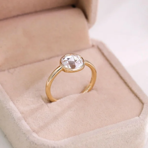 Additional product photograph showing the ring design, setting and band.