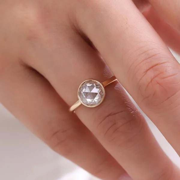 Additional product photograph showing the ring design, setting and band.