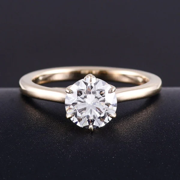 Additional product photograph showing the ring design, setting and band.