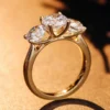 Round Lab-Grown Diamond Three-Stone Ring in 14K Solid Gold shown in the product photograph.