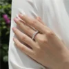 Additional product photograph showing the ring design, setting and band.