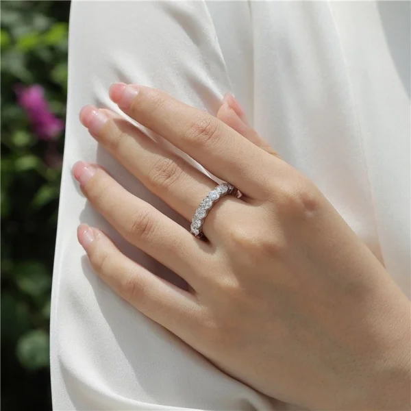 Additional product photograph showing the ring design, setting and band.