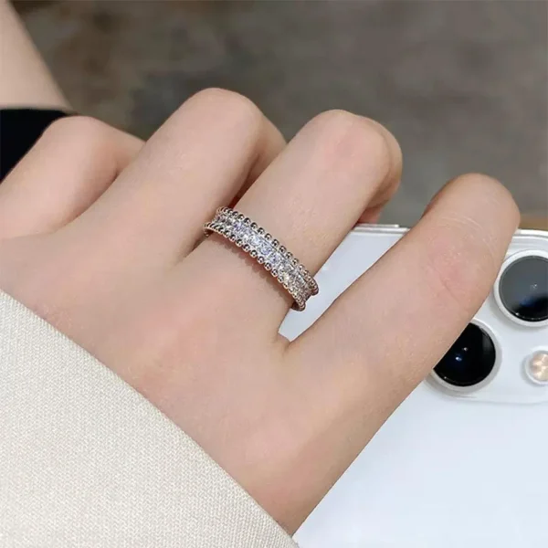 Additional product photograph showing the ring design, setting and band.