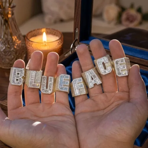Product photograph showing the letter jewelry design collection.