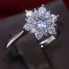 Round Moissanite Floral Ring in 14K Solid Gold shown in the product photograph.