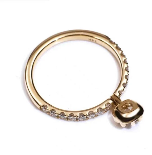 Additional product photograph showing the ring design, setting and band.