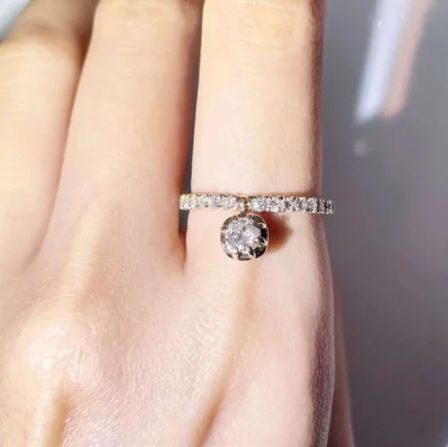 Round Moissanite Half Eternity Ring in Gold - Product View Round Moissanite Half Eternity Ring in Gold shown in the product photograph.