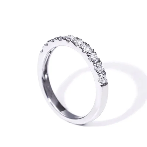 Round Moissanite Half Eternity Ring in Gold - Product View Round Moissanite Half Eternity Ring in Gold shown in the product photograph.