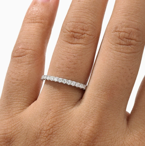 Additional product photograph showing the ring design, setting and band.