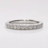 Round Moissanite Half Eternity Ring in Silver shown in the product photograph.