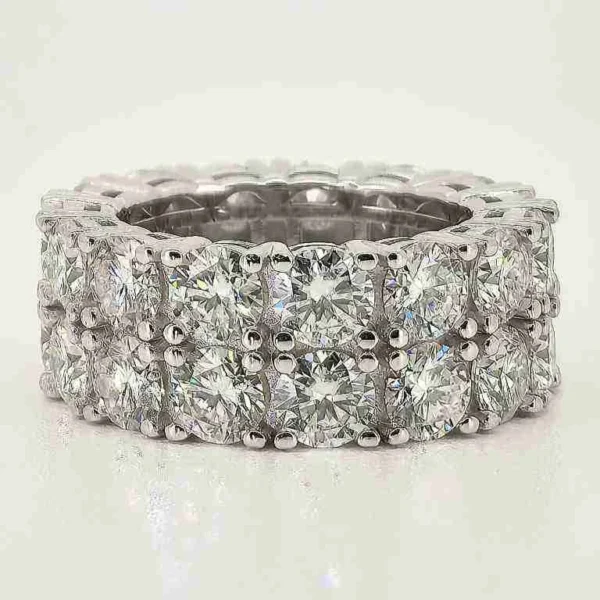 Round Moissanite Iced-Out Ring in 925 Sterling Silver shown in the product photograph.