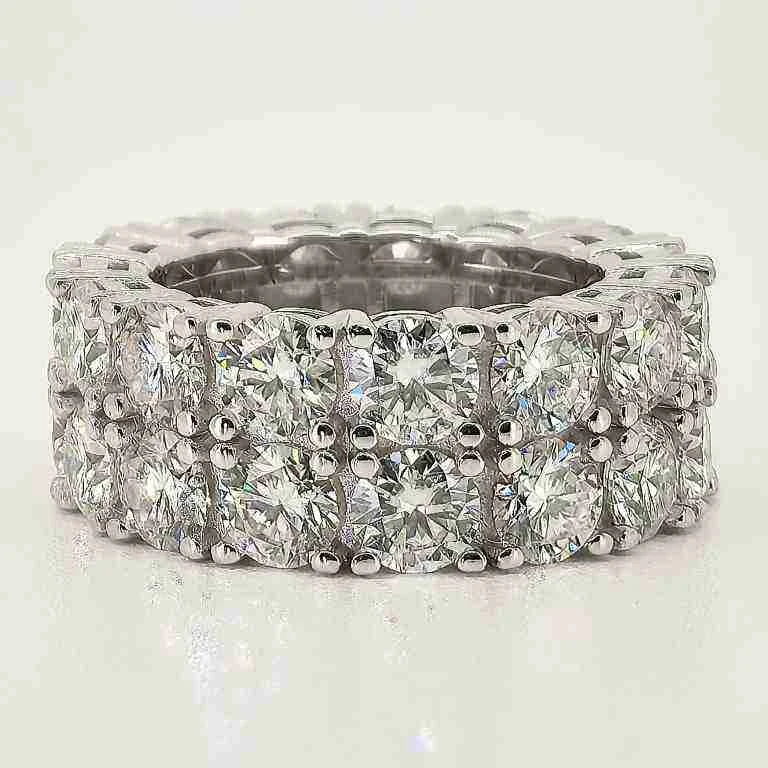 Round Moissanite Iced-Out Ring in 925 Sterling Silver shown in the product photograph.