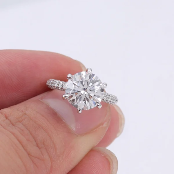Additional product photograph showing the ring design, setting and band.