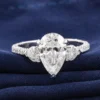 Product photograph showing the pear three-stone ring.