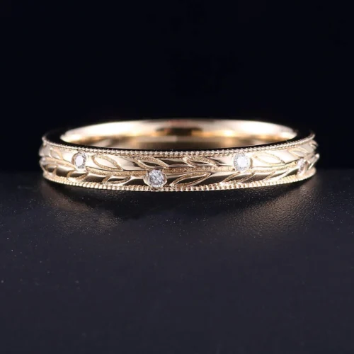 Product photograph showing the engraved band ring.