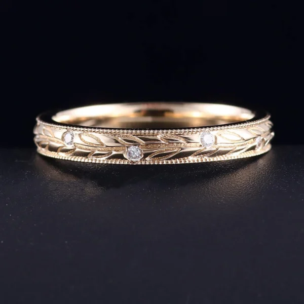 Product photograph showing the engraved band ring.