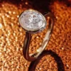 Additional product photograph showing the ring design, setting and band.